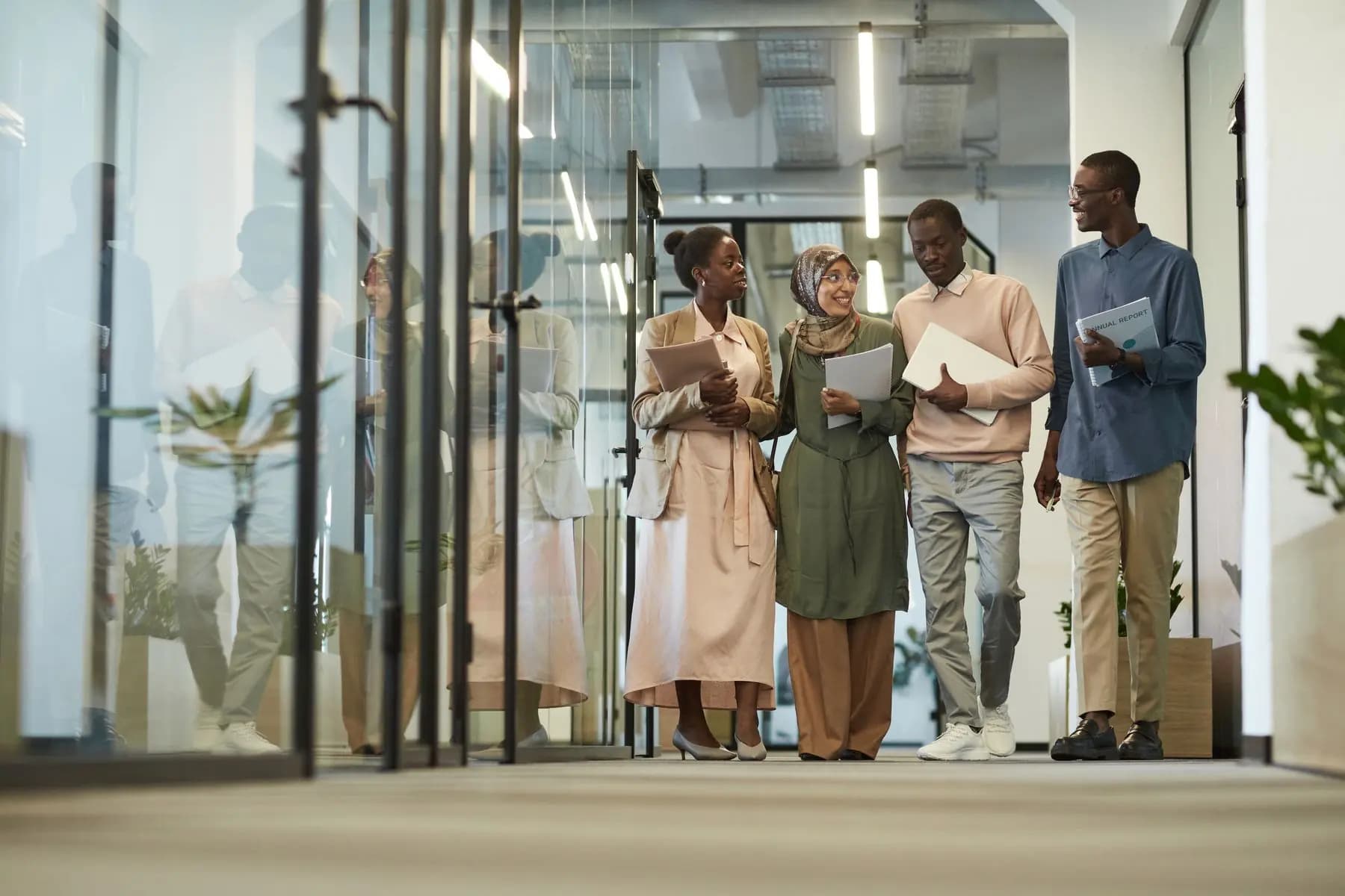International colleagues moving through a modern office